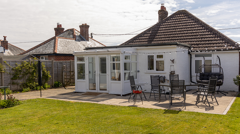 Sunny outdoor seating at Our Bench, ideal for a rare summer short break